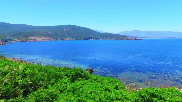 beach of the grand lighthouse of jijel algeria in a sunny day