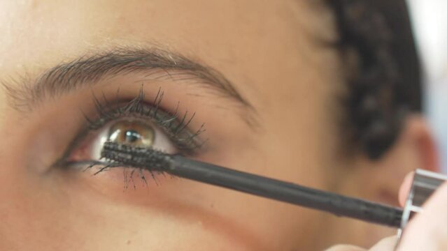 Beautiful eyes makeup mascara on green eyed model, for editorial fashion photoshoot