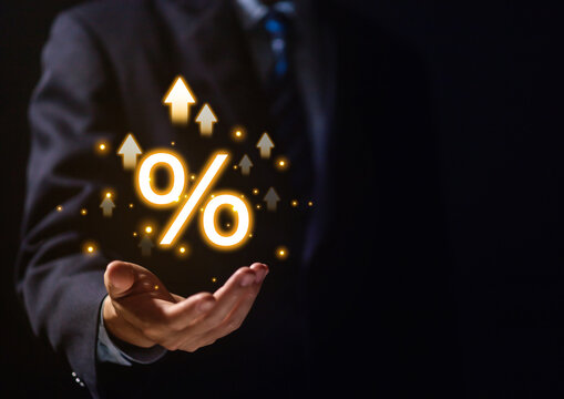 hands showing the percentage symbol icon. Investing profits increases or decreases stocks.	
