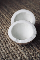 Coconut with coconut fibre carpet on the bottom. Coconut texture. Extraction process.
