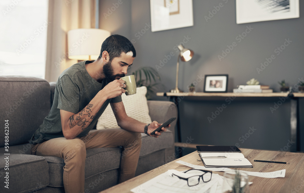 Sticker tracking his spending with smart apps. a young man having coffee and using a smartphone while going 