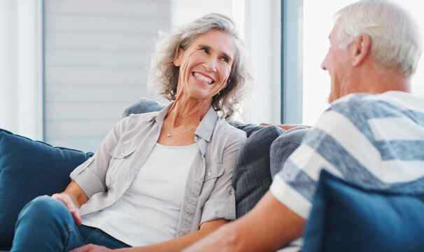 Less Work, Less Worries. A Senior Couple Relaxing On The Sofa At Home.