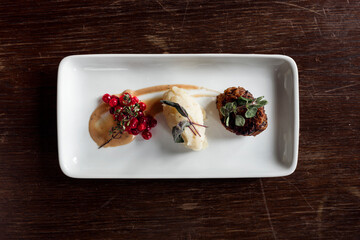 Various gourmet foods on plate