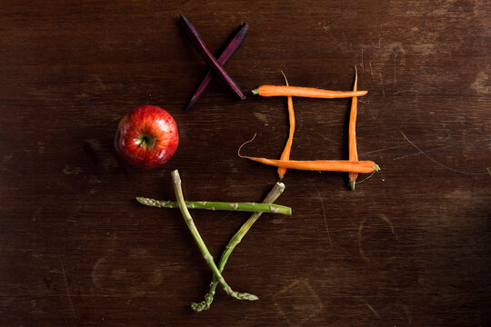 Fruit and vegetables creating various shapes