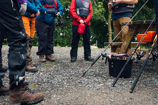 Group of people having fishing training