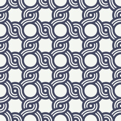 Seamless repeating pattern with chained striped circles. Decorative motif in retro style. Blue and white geometric vector illustration.