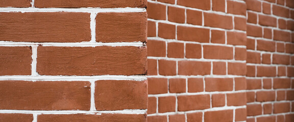 Minimal fragment of brick wall angle close up. Beautiful minimalist brick perspective texture backdrop. Geometric background of brick wall pattern. Modern design of interior or exterior close-up.