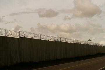 Background of prison warfare, barbed wire fence in Phuket Thailand