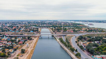 Astrakhan, Russia. Bridges across channel named Varvatsiya. Night city lights, Aerial View