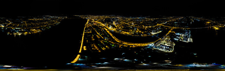 Astrakhan, Russia. Panorama 360 of the city from the air. Night city lights. Aerial view