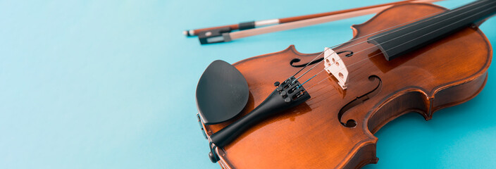 Violin isolated on blue background