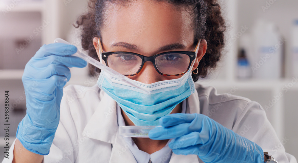 Wall mural science is about seeing how things react. a young scientist analysing samples in a lab.