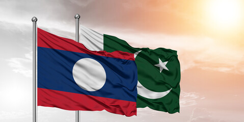 Flags of Pakistan and Laos friendship flag waving on the sky with beautiful Background.