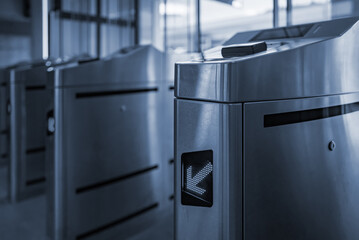 Ticket validator gates at train station.