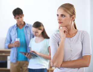 Fototapeta premium I wonder if that could work. Three young colleagues working in the office.