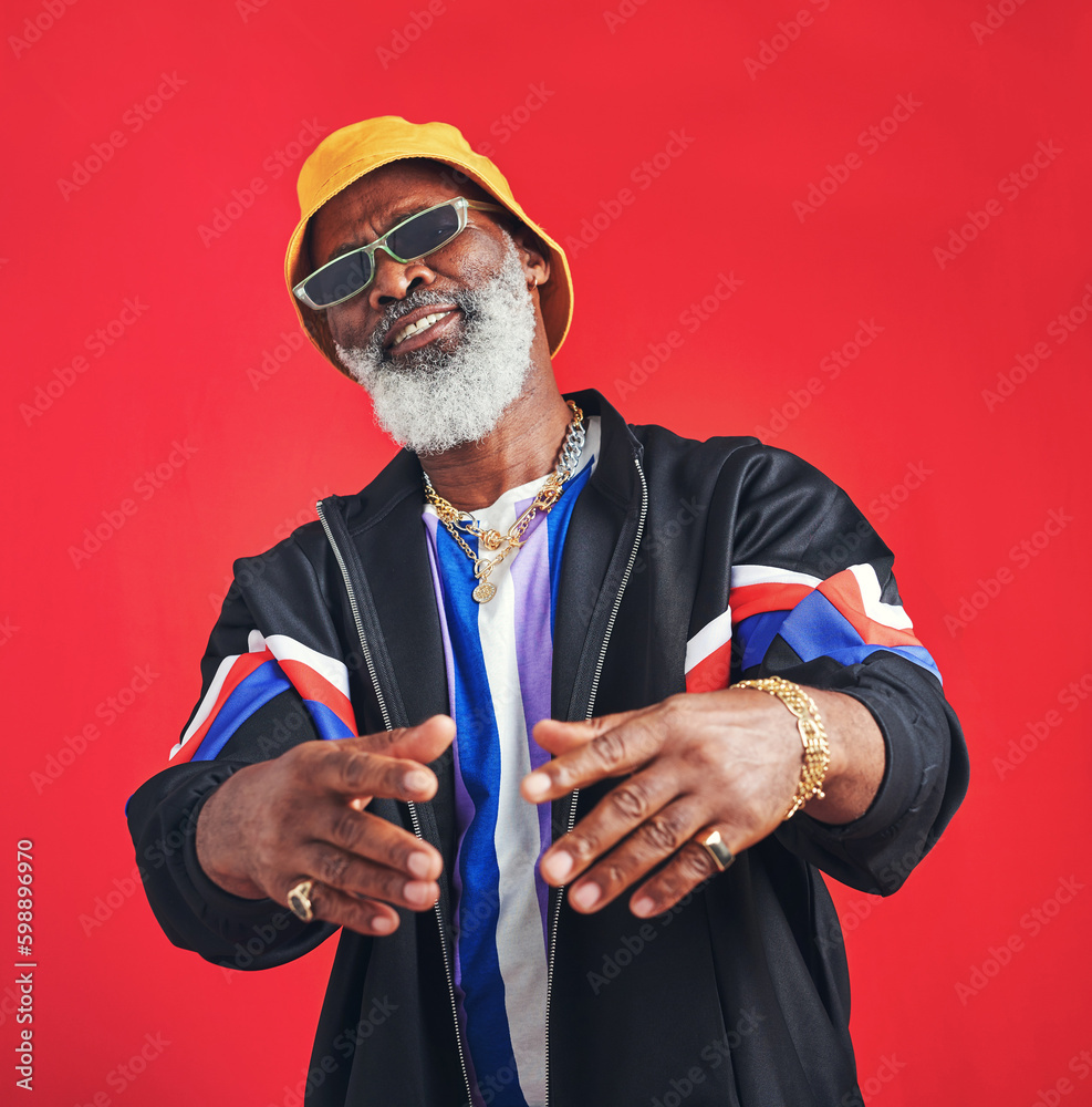 Poster lets have a chat about whats really in fashion. studio shot of a senior man wearing retro attire whi