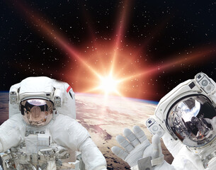 Fototapeta na wymiar Astronauts flies in space. The elements of this image furnished by NASA.