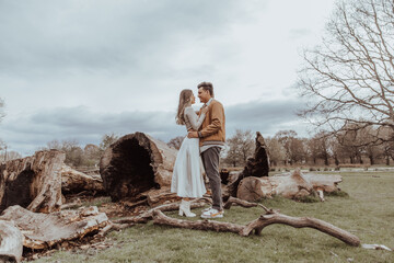 happy couple in the park on a beautiful sunny day