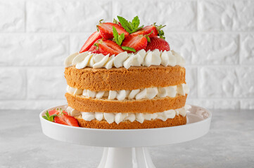 Strawberry cake, vanilla sponge cake with cream cheese and fresh strawberries. Summer cake....