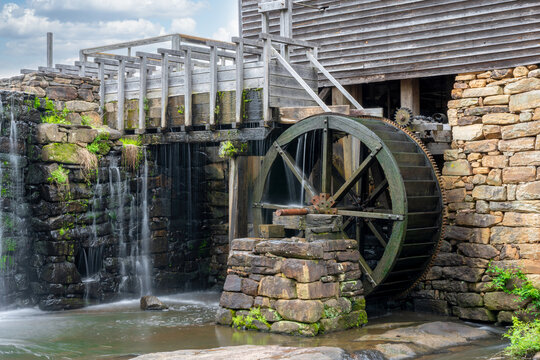Yates Mill in North Carolina closeup of waterwheel, and building.
