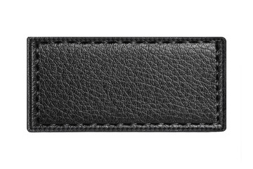 Black leather belt strap closeup isolated on white. Black stitched leather seam frame label tag...