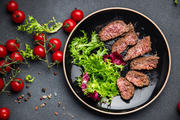 beef steak rare fried piece of meat roasting healthy meal food snack on the table copy space food background rustic top view keto or paleo diet