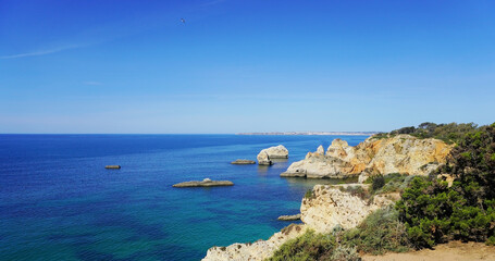 Beautiful landscape with blue ocean near Alvor town, Algarve region, Portugal