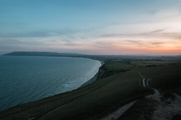 Sunset view of the sea from a clifftop