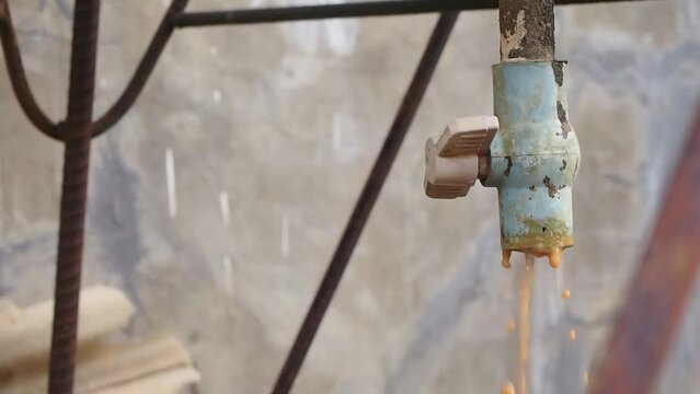 The process of draining dirty water from the water reservoir.