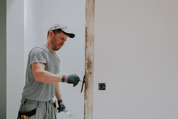 A person working in a doorway.