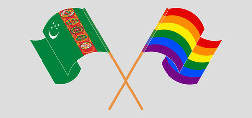 Crossed and waving flags of Turkmenistan and LGBTQ