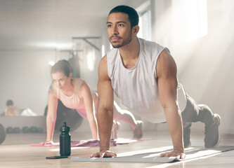 Complaining wont get you anywhere. two young athletes working out together at the gym.