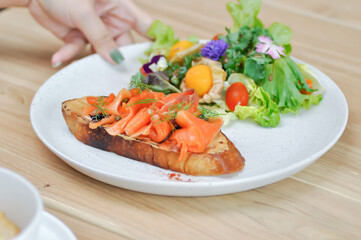 salmon canape or bread with salmon and caviar topping