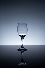 empty wine glass on gray background