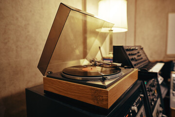 Record player on a table in a recording studio