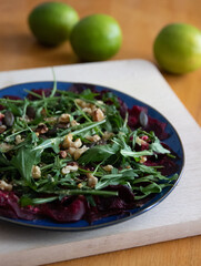 beetroot carpaccio with nuts and rucola