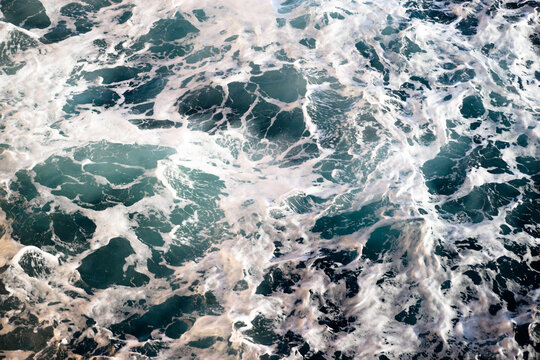 Blue waves, white sea foam background