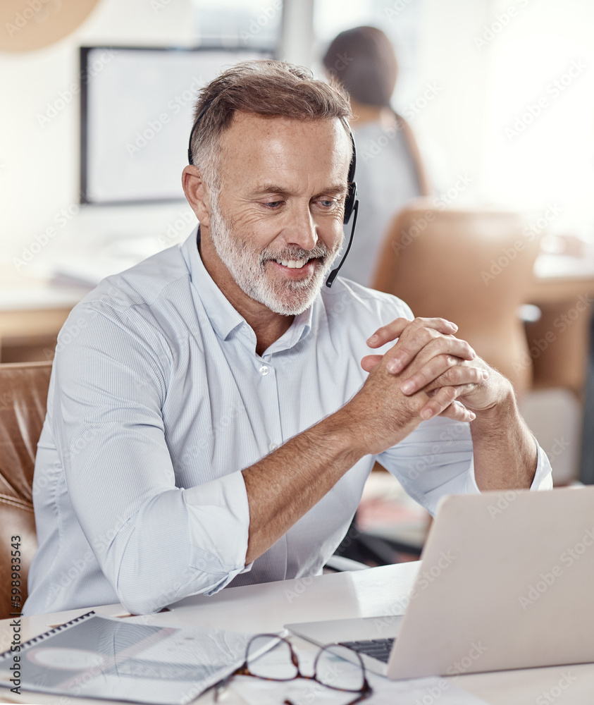 Poster glad to hear youve had a good experience with us. a mature man using a headset and laptop in a moder