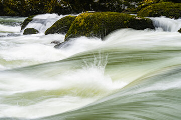 Fototapeta na wymiar Long Exposure Image of Stillaguamish River Rapids