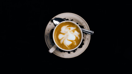 A cup of latte with milk