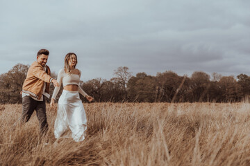 happy couple in the park on a beautiful sunny day