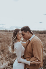 happy couple in the park on a beautiful sunny day