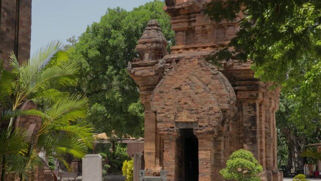 tourists see the sights of the Thap Ba Ponagar tower and take pictures with it