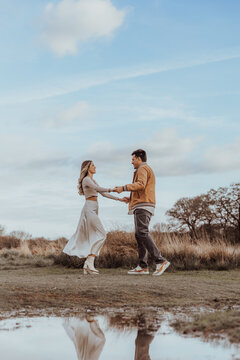 happy couple in the park on a beautiful sunny day