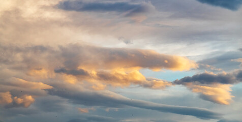 Beautiful bright summer sunset sky with clouds. Sunset sky  clouds background.