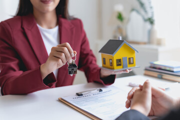 Real estate agent present house and land to their client by offering example of model home Introducing home loan loan, preliminary installment Offer idea for mortgage loan and home insurance.