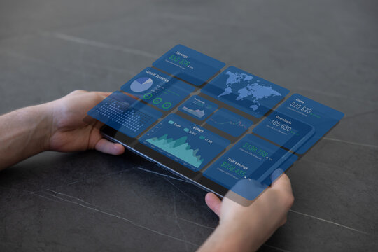 Businessman finger touch tablet in hand, double exposure with glowing forex analysis dashboard, stock market candlesticks with bar chart and statistics. Concept of big business data.