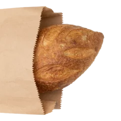 Abwaschbare Fototapete Bäckerei fresh bread or whole grain bread in paper bag isolated on white