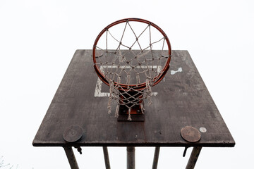 Old basketball hoop. Basketball hoop in the ghetto