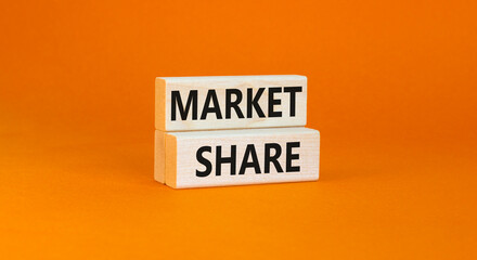 Market share symbol. Concept words Market share on beautiful wooden block. Beautiful orange table orange background. Business and Market share concept. Copy space.